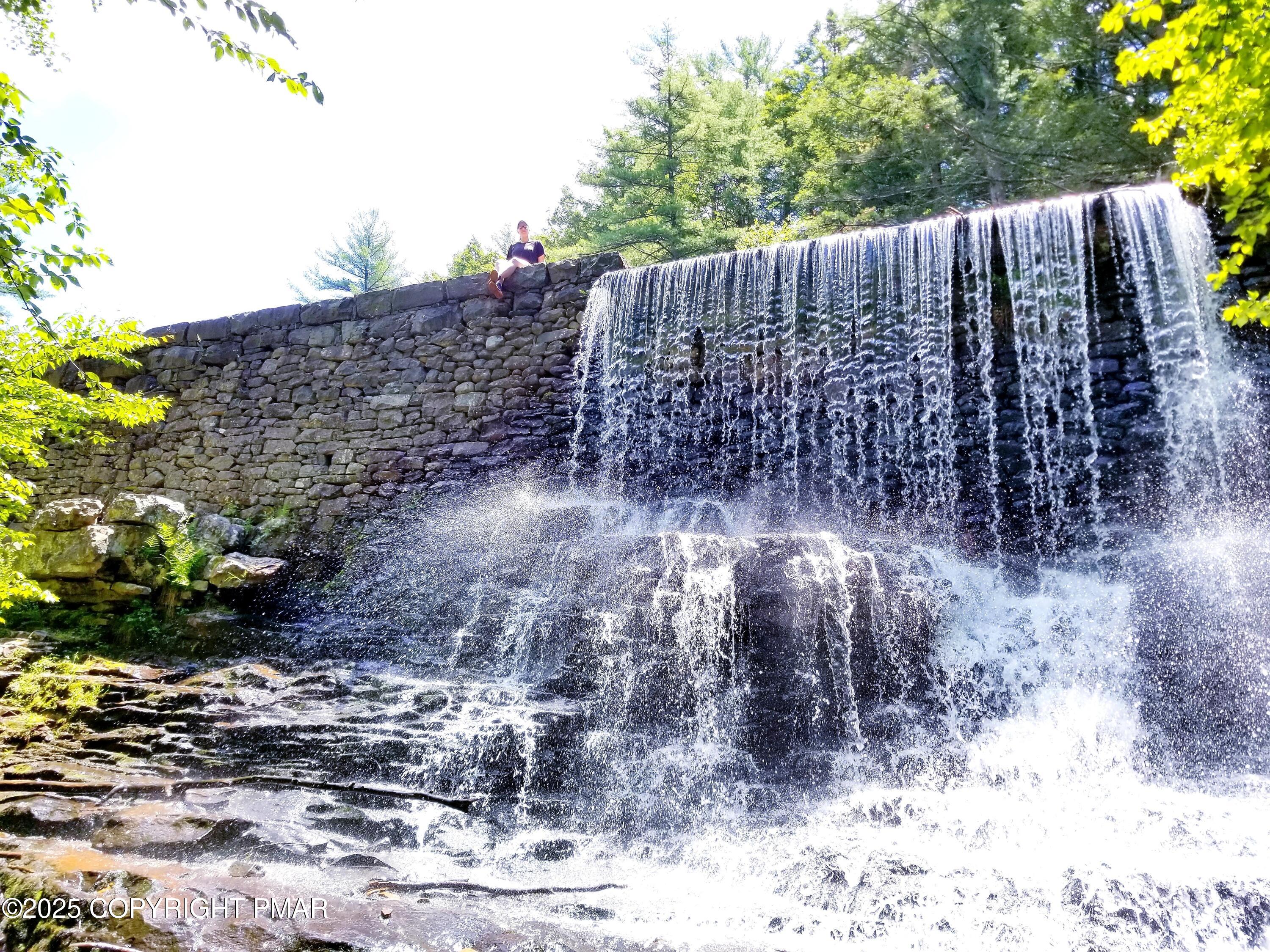115 Foxfire Drive, Unit 306 Mount Pocono, PA 18344 - Photo 11 of 19 a view of a wooden fence