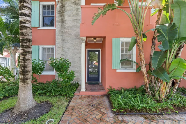 a front view of a house with yard