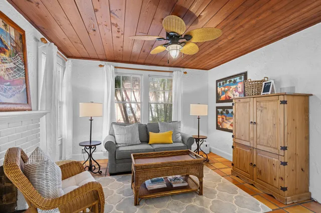 a bedroom with furniture and a chandelier