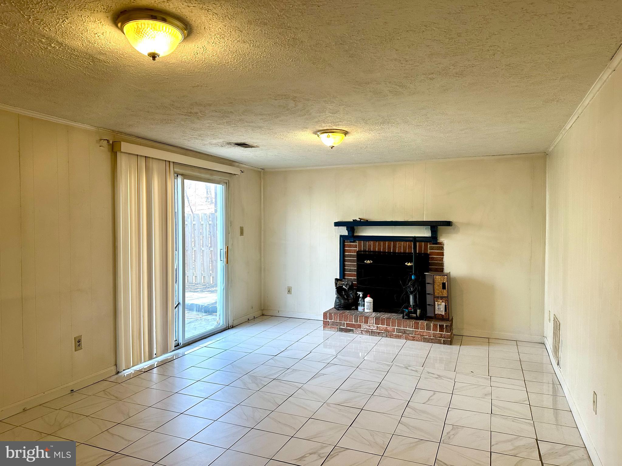 8357 Luce Court Springfield, VA 22153 - Photo 15 of 28 family room with a walk out to the backyard