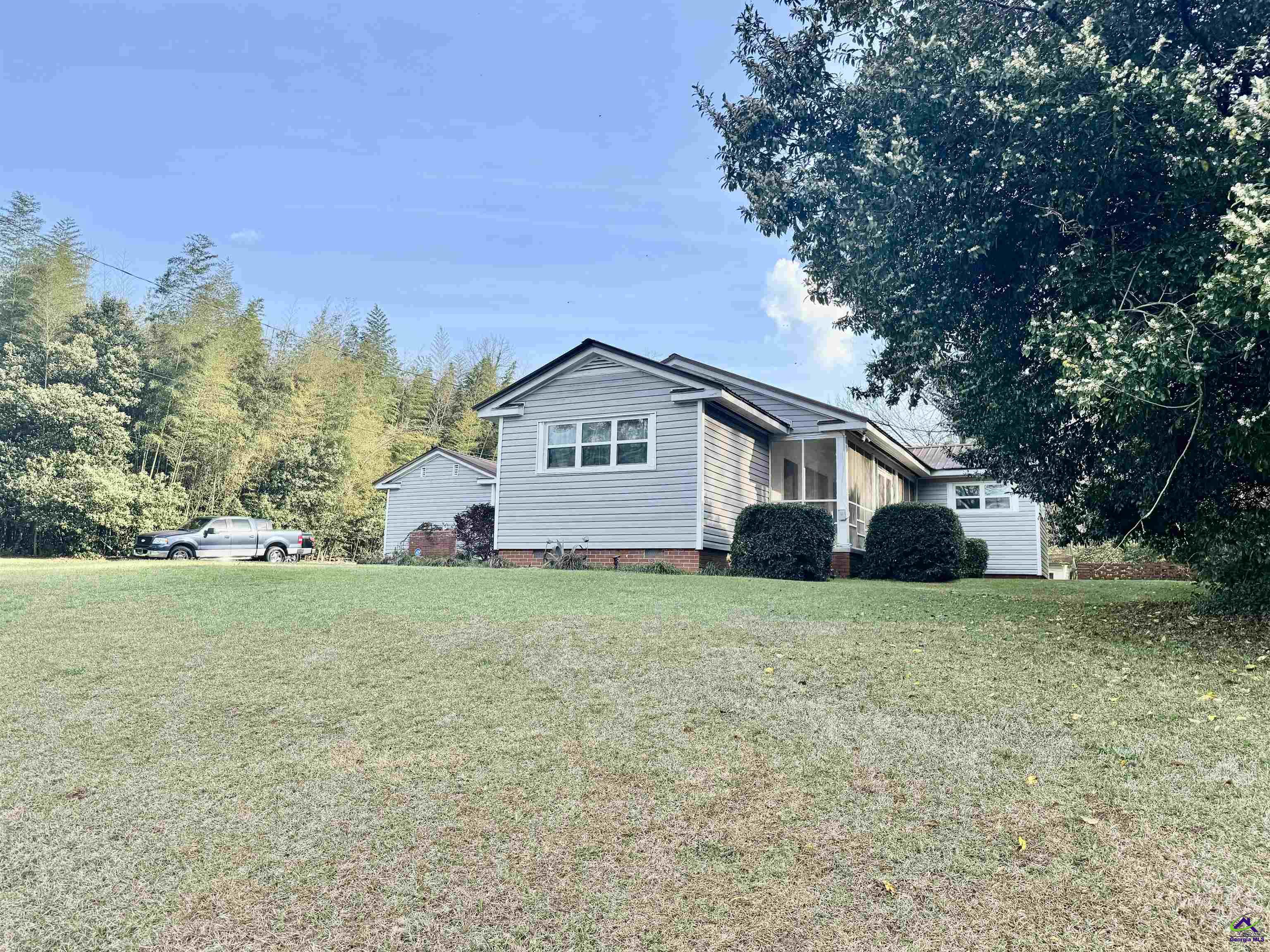 914 Adderton Street Americus, GA 31719 - Photo 4 of 53 a house with garden in front of it