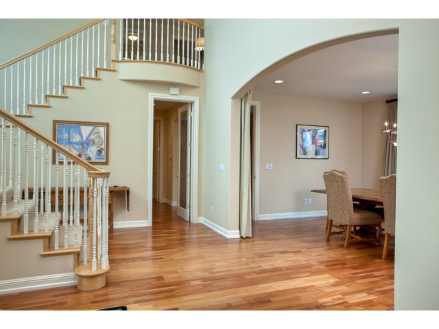 143 Cypress Point Road Half Moon Bay, CA 94019 - Photo 4 of 21 a view of a livingroom with wooden floor and furniture