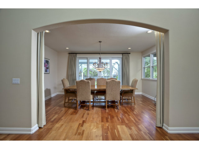 143 Cypress Point Road Half Moon Bay, CA 94019 - Photo 8 of 21 a dining room with furniture and wooden floor