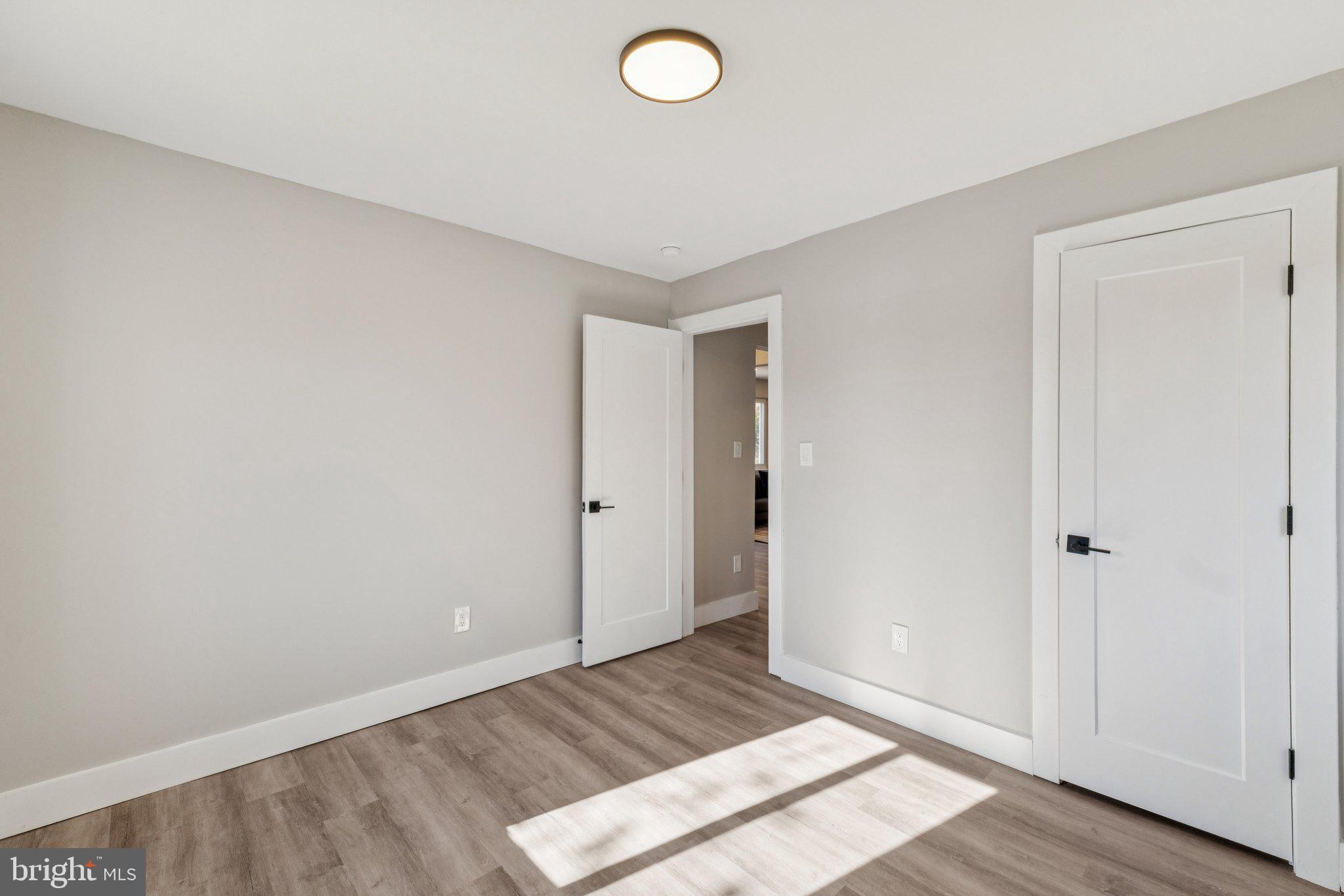 10101 Greeley Avenue Silver Spring, MD 20902 - Photo 13 of 25 a view of an empty room and window