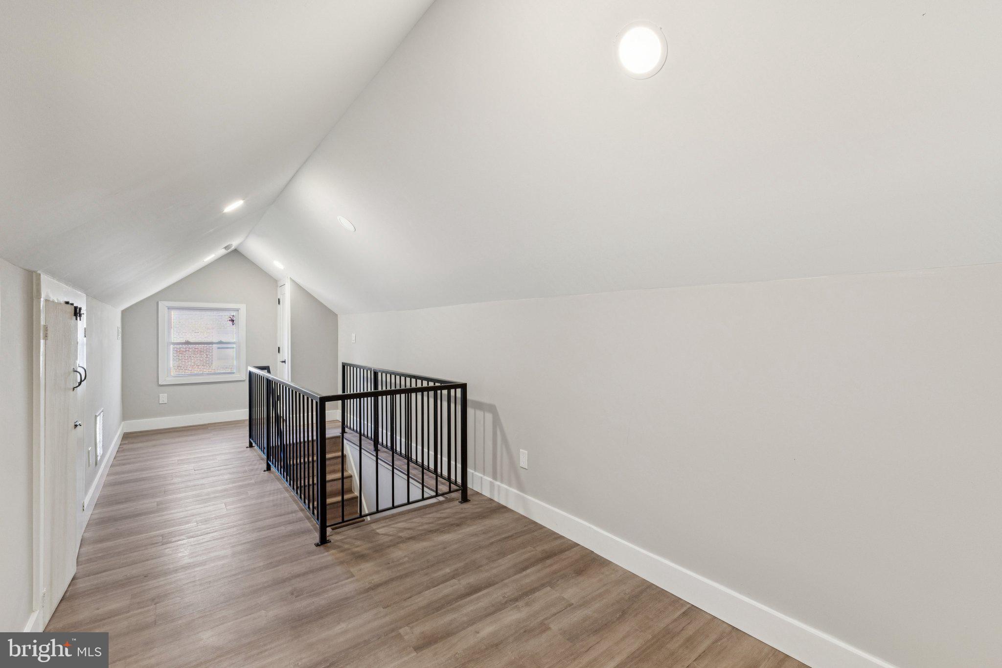 10101 Greeley Avenue Silver Spring, MD 20902 - Photo 15 of 25 a view of a hallway with wooden floor