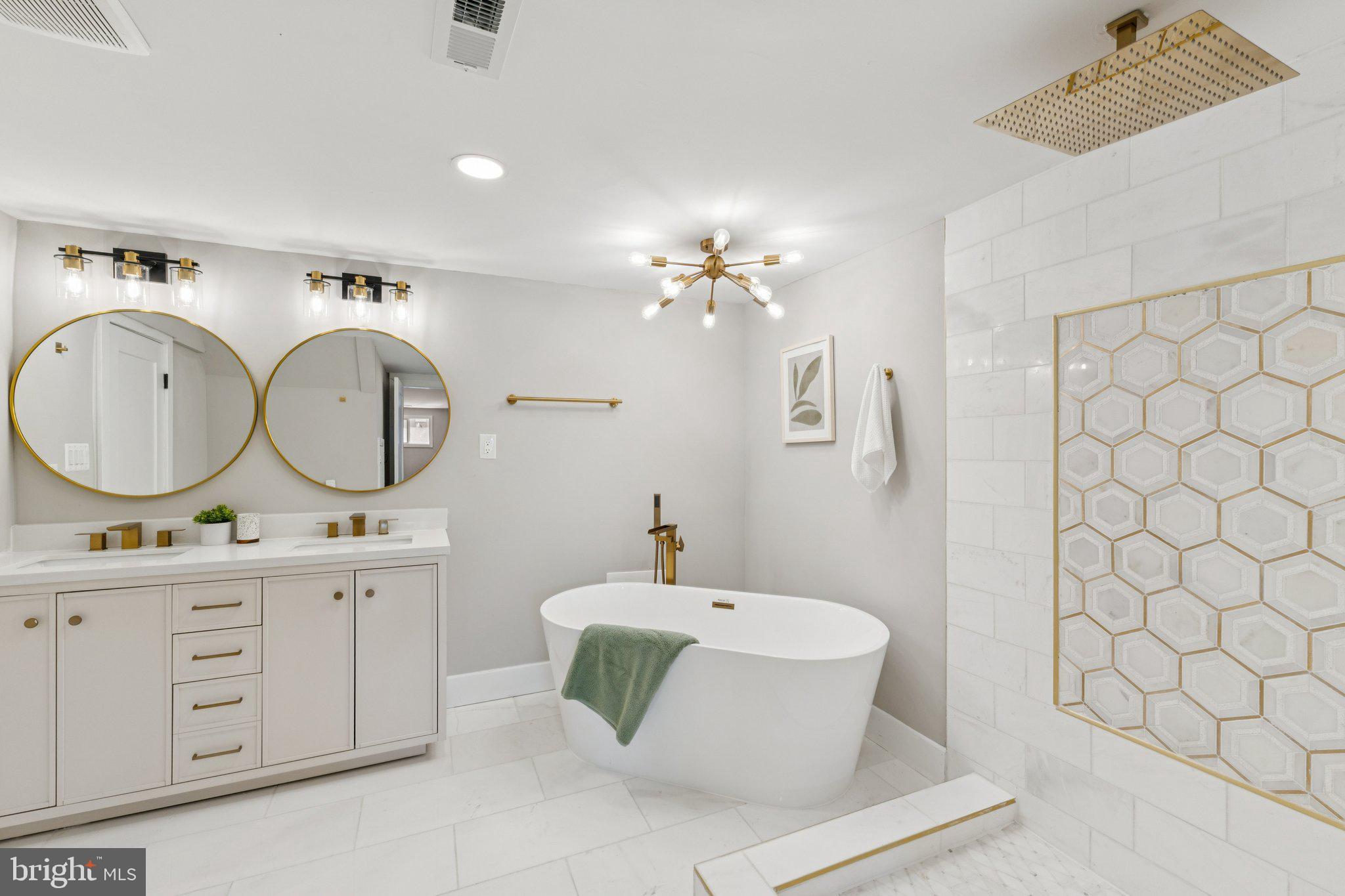 10101 Greeley Avenue Silver Spring, MD 20902 - Photo 21 of 25 a bathroom with a double vanity sink and a mirror
