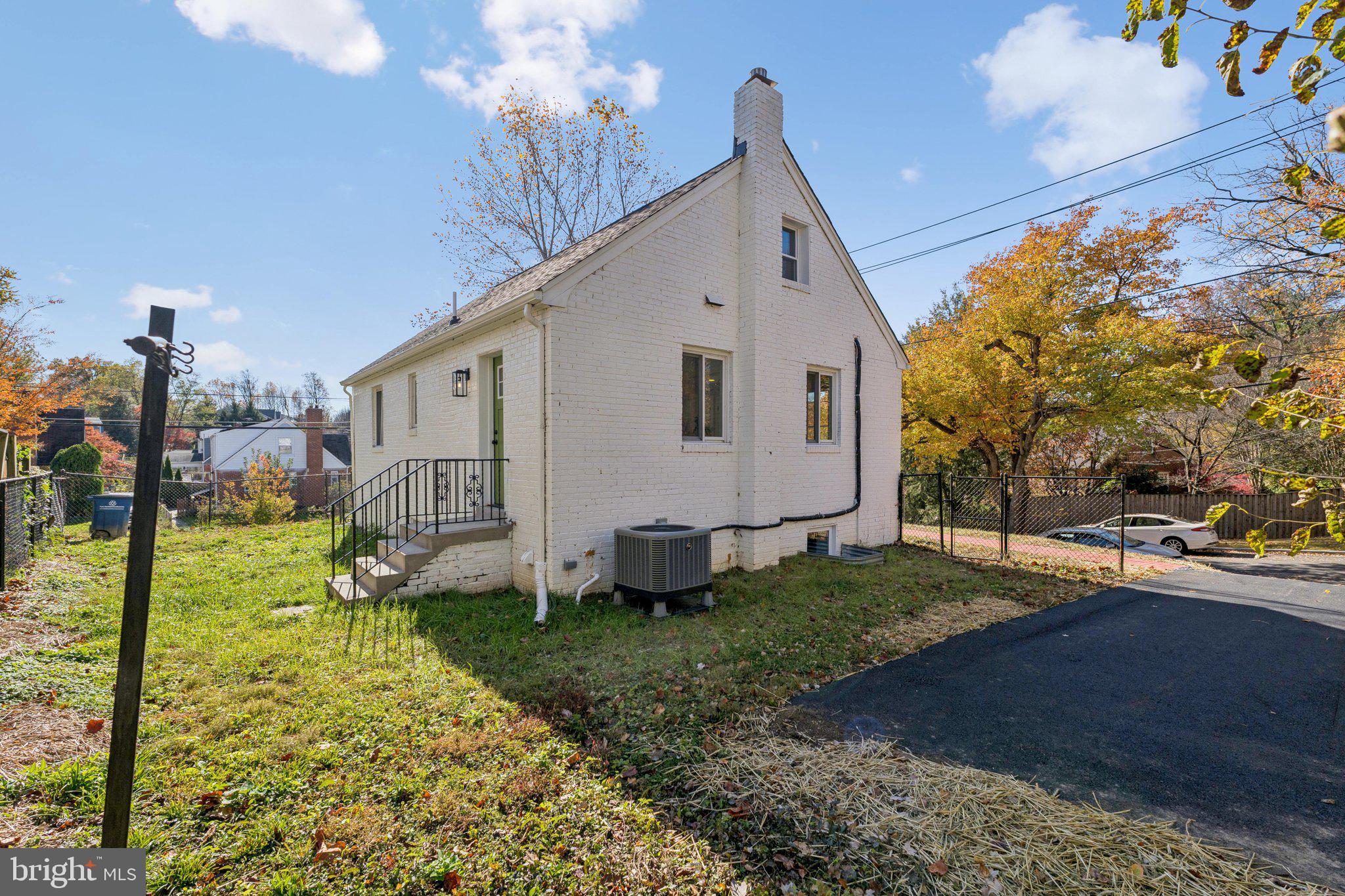 10101 Greeley Avenue Silver Spring, MD 20902 - Photo 22 of 25 a view of a house with backyard and trees