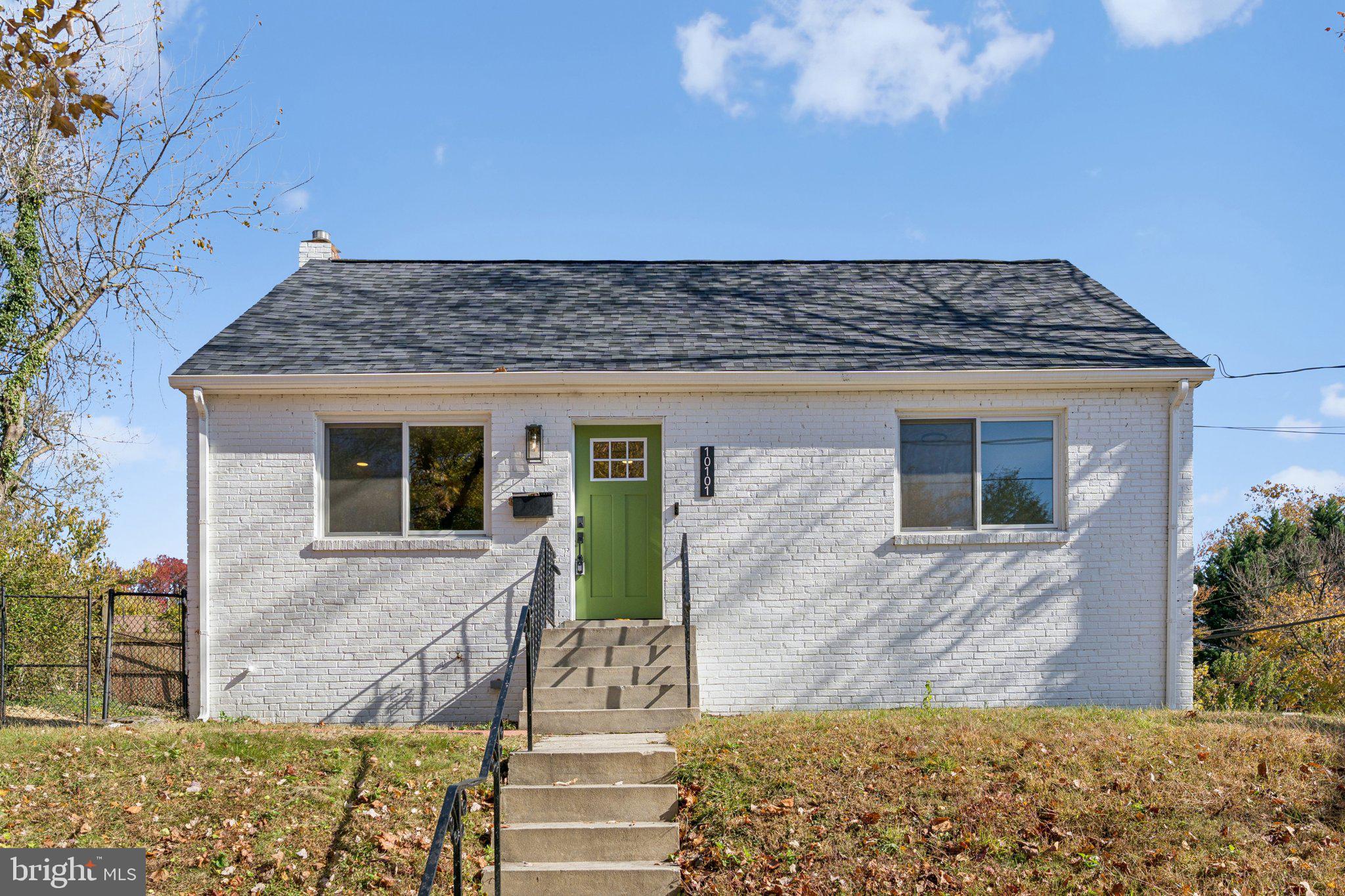 10101 Greeley Avenue Silver Spring, MD 20902 - Photo 23 of 25 a front view of a house with garden
