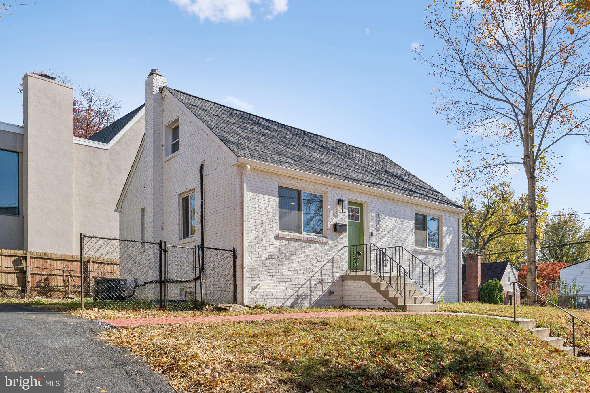 10101 Greeley Avenue Silver Spring, MD 20902 - Photo 24 of 25 a view of a house with a yard