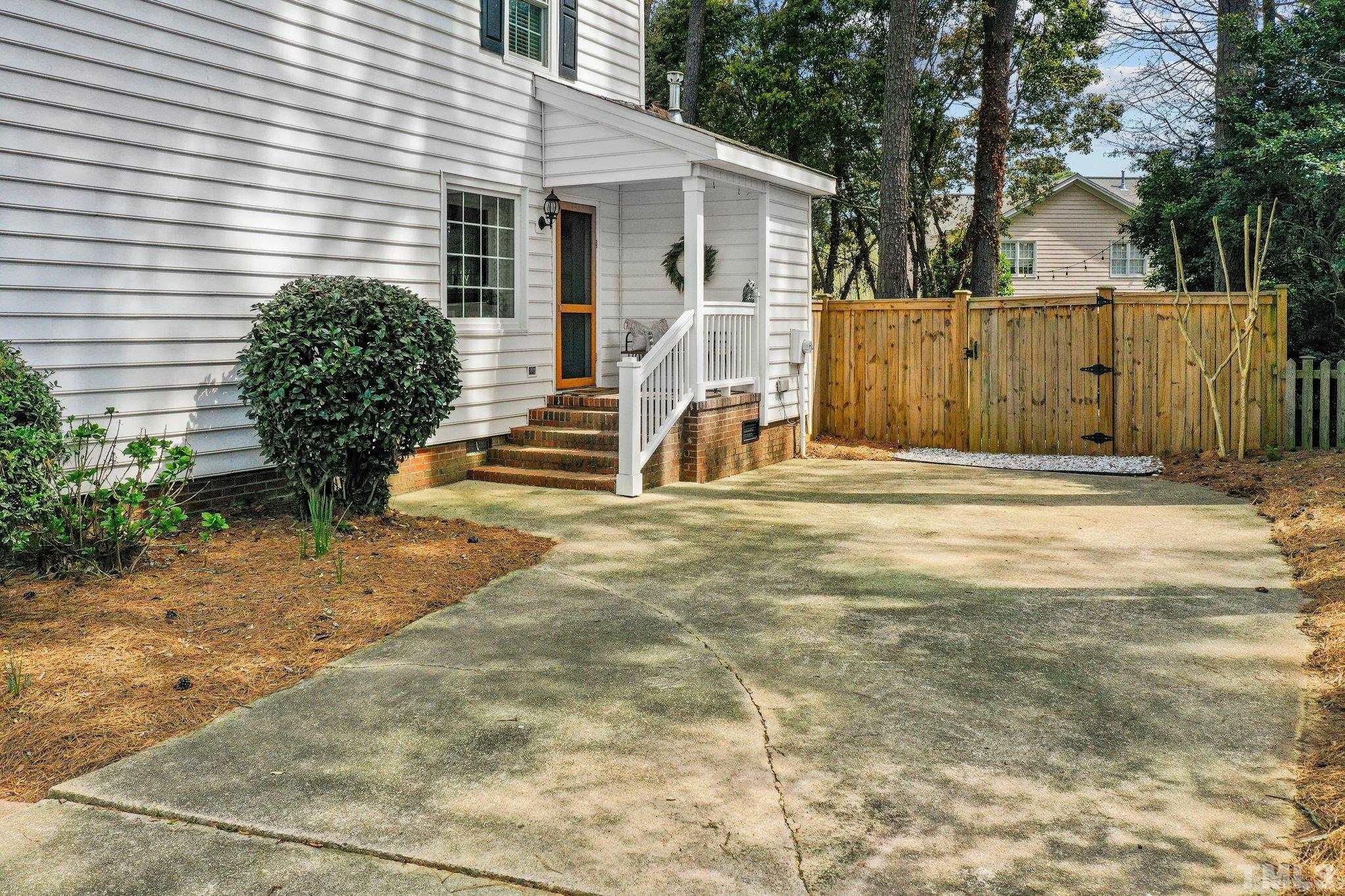 6212 Wynbrook Way Raleigh, NC 27612 - Photo 35 of 45 a view of a house with backyard