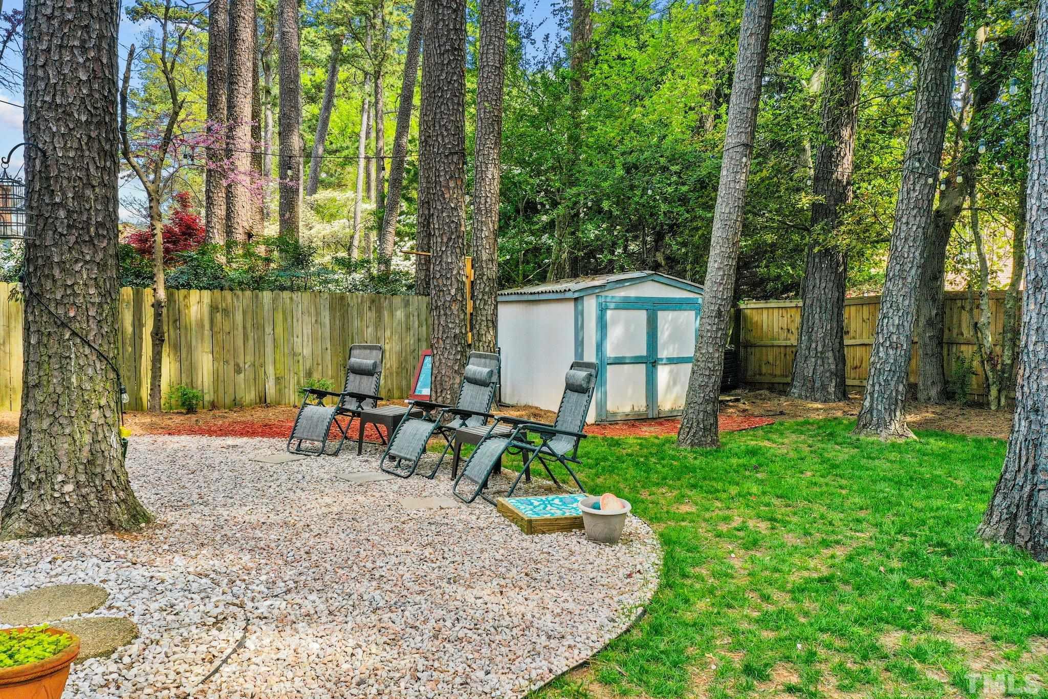 6212 Wynbrook Way Raleigh, NC 27612 - Photo 41 of 45 a view of a house with backyard and sitting area