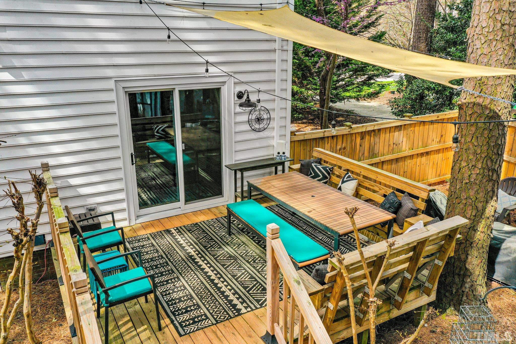 6212 Wynbrook Way Raleigh, NC 27612 - Photo 45 of 45 a balcony with table and chairs