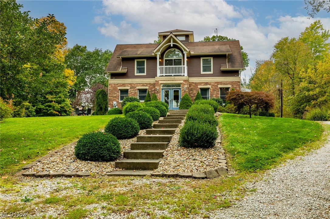 2097 Butler Road Wakeman, OH 44889 - Photo 1 of 34 View of front facade featuring a front lawn