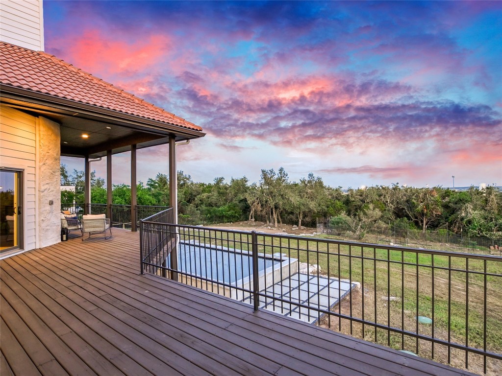 3901 Peak Lookout Drive Austin, TX 78738 - Photo 4 of 15 a view of a patio with a table & chairs