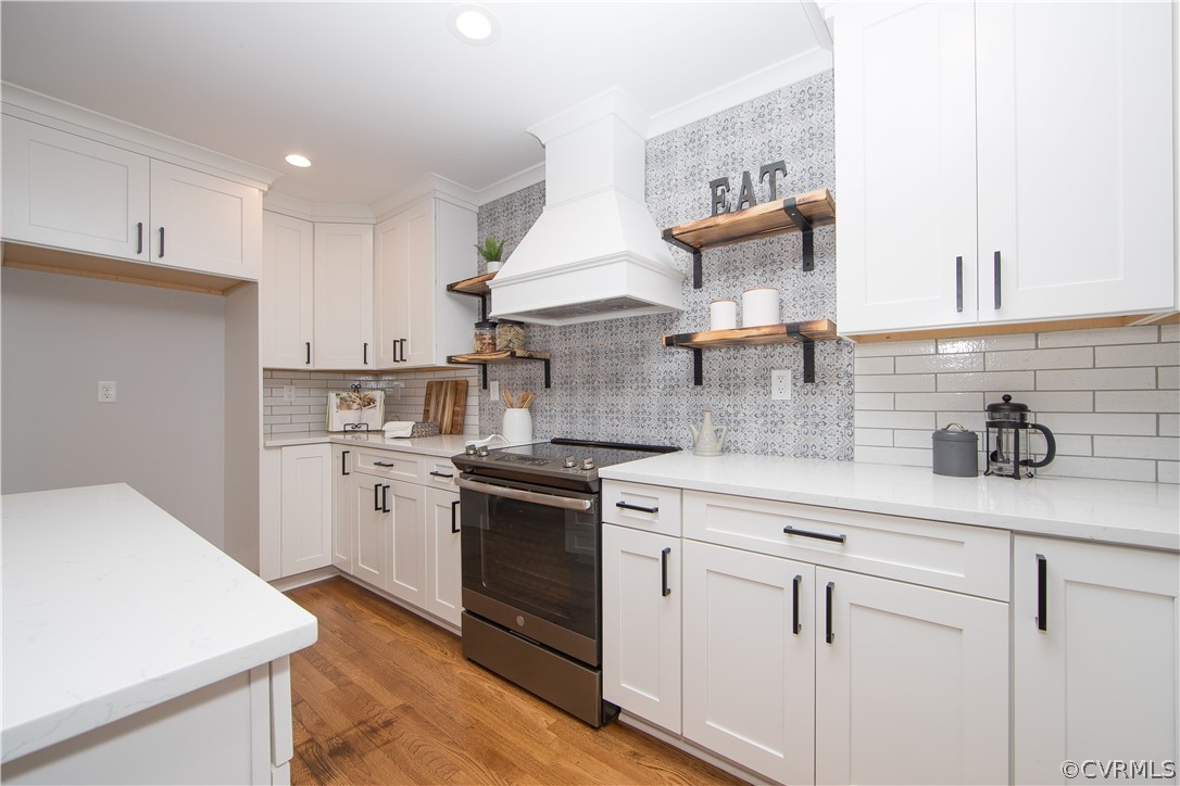 4213 Brook Road Richmond, VA 23227 - Photo 15 of 49 a kitchen with cabinets and stainless steel appliances