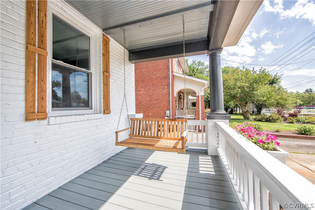 4213 Brook Road Richmond, VA 23227 - Photo 41 of 49 a balcony with wooden floor and outdoor space