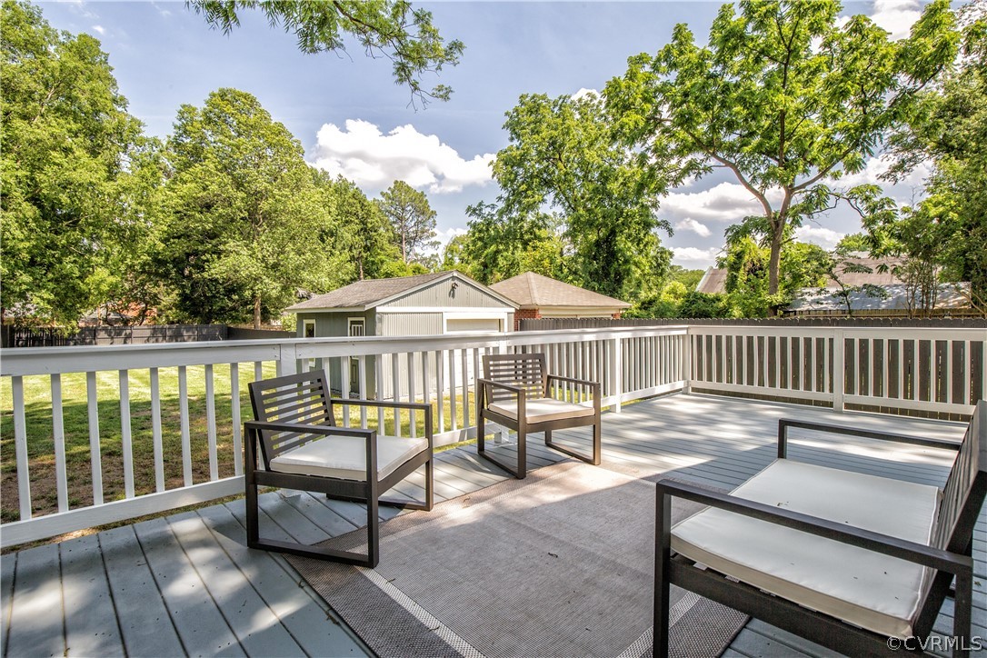 4213 Brook Road Richmond, VA 23227 - Photo 44 of 49 a view of a chairs and table on the deck