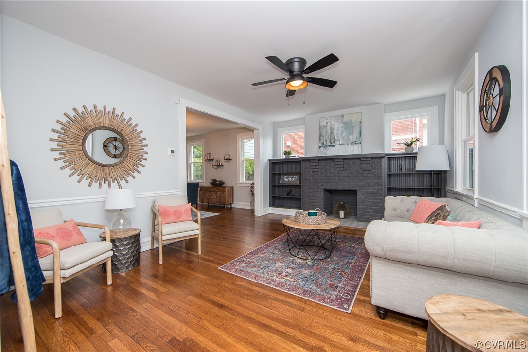 4213 Brook Road Richmond, VA 23227 - Photo 5 of 49 a living room with furniture and a fireplace
