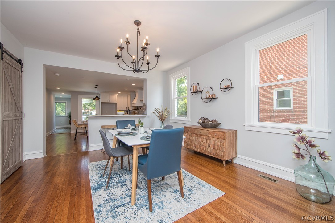 4213 Brook Road Richmond, VA 23227 - Photo 9 of 49 a view of a dining room with furniture and wooden floor