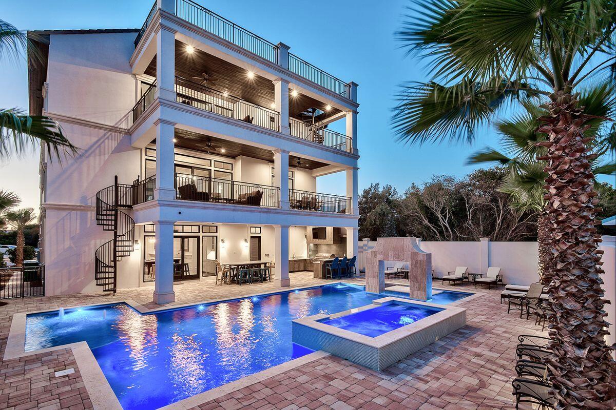 a view of pool with outdoor seating