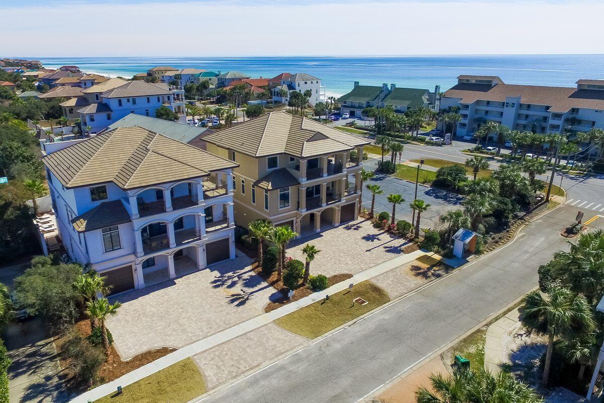 55 Sunfish Street Destin, FL 32541 - Photo 13 of 49 aerial view of a house with a swimming pool and outdoor seating