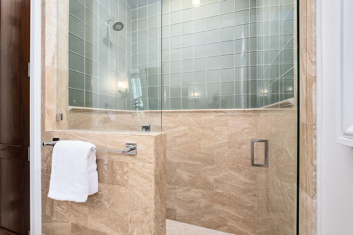 55 Sunfish Street Destin, FL 32541 - Photo 29 of 49 a bathroom with a sink and shower