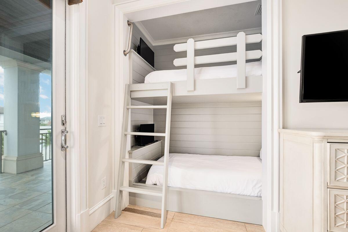 55 Sunfish Street Destin, FL 32541 - Photo 36 of 49 a bathroom with a tub and a view of living room