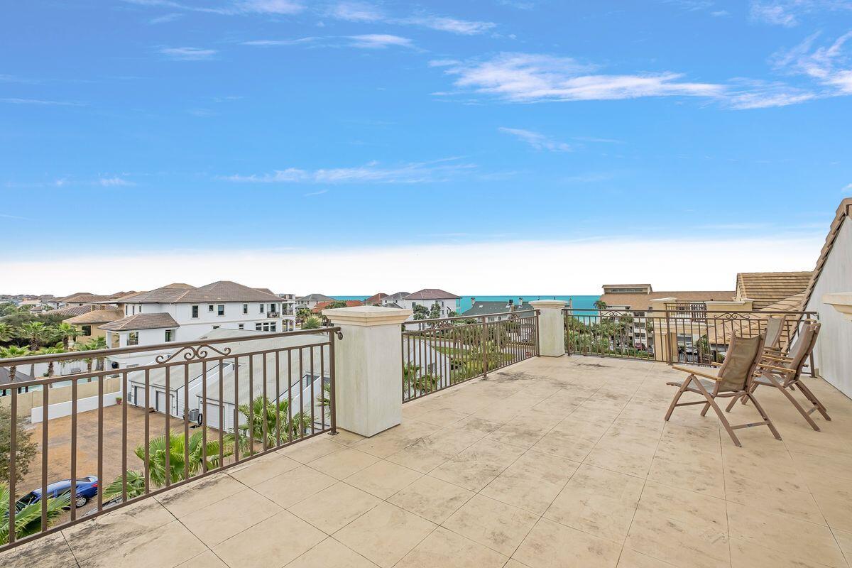 55 Sunfish Street Destin, FL 32541 - Photo 44 of 49 a view of a terrace with a bench