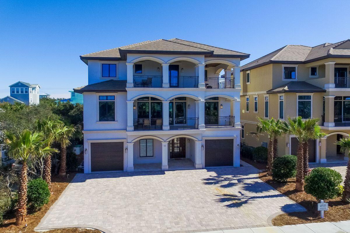 55 Sunfish Street Destin, FL 32541 - Photo 46 of 49 a front view of a house with yard and parking