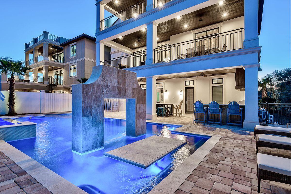 55 Sunfish Street Destin, FL 32541 - Photo 48 of 49 a living room with furniture and wooden floor