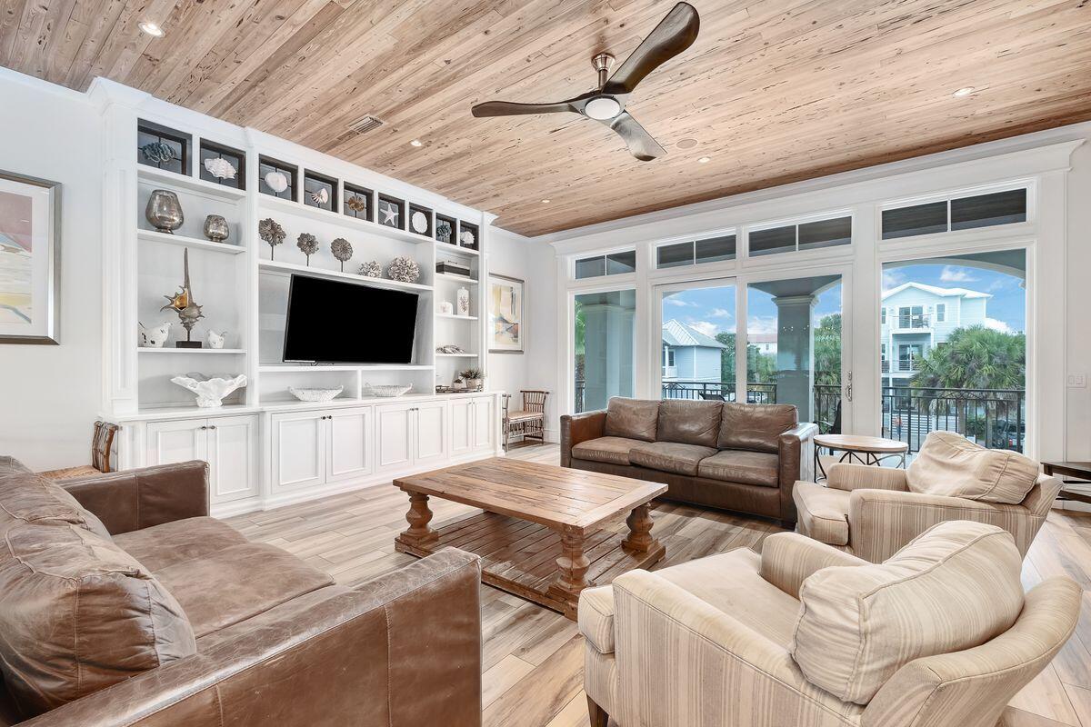 55 Sunfish Street Destin, FL 32541 - Photo 8 of 49 a living room with furniture and a flat screen tv