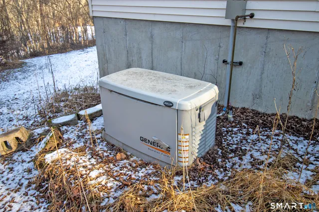 a utility room with a wooden floor