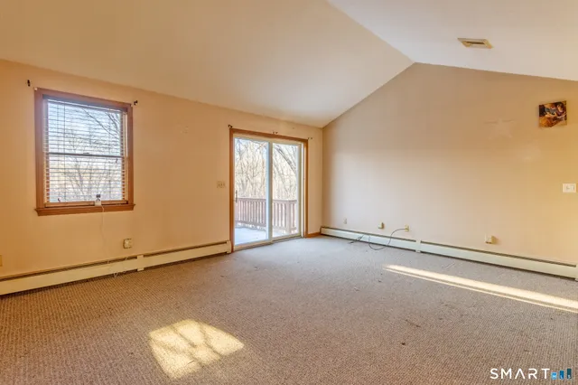 an empty room with windows