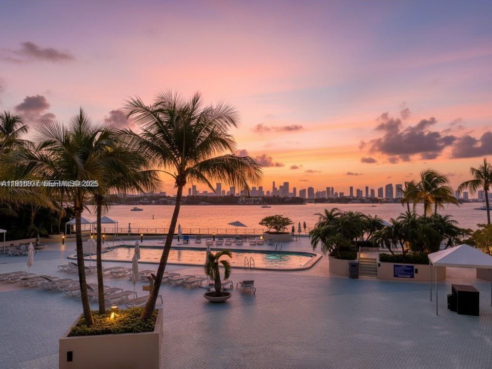 1200 West Avenue, Unit 316 Miami Beach, FL 33139 - Photo 23 of 44 a view of a swimming pool with lounge chair