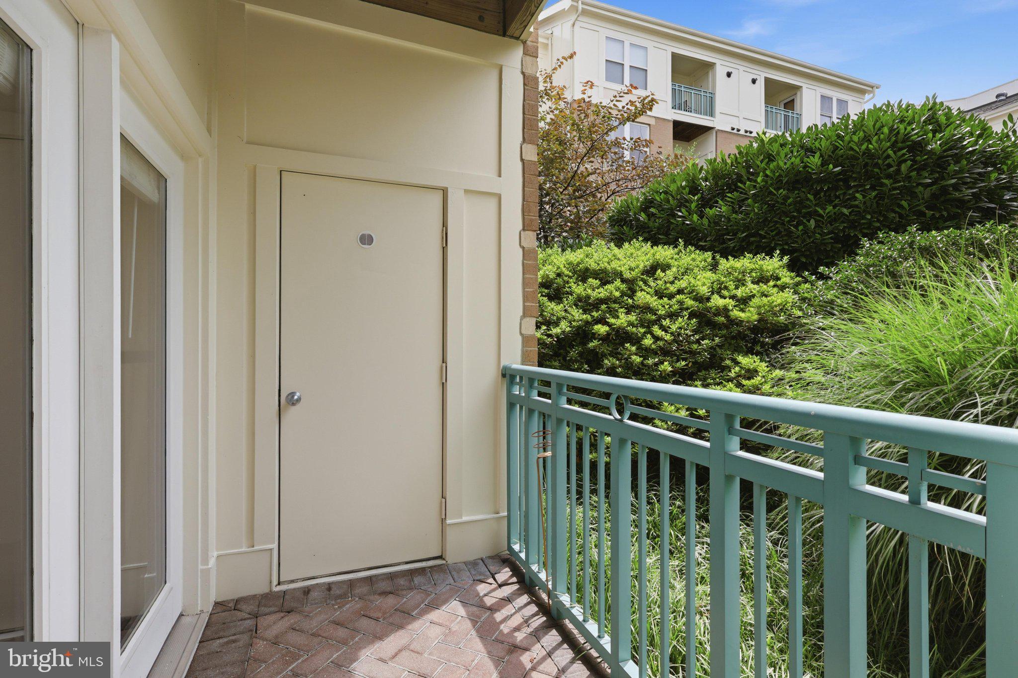 12001 Market Street, Unit 179 Reston, VA 20190 - Photo 23 of 48 Lovely Patio Overlook Lush Greenery