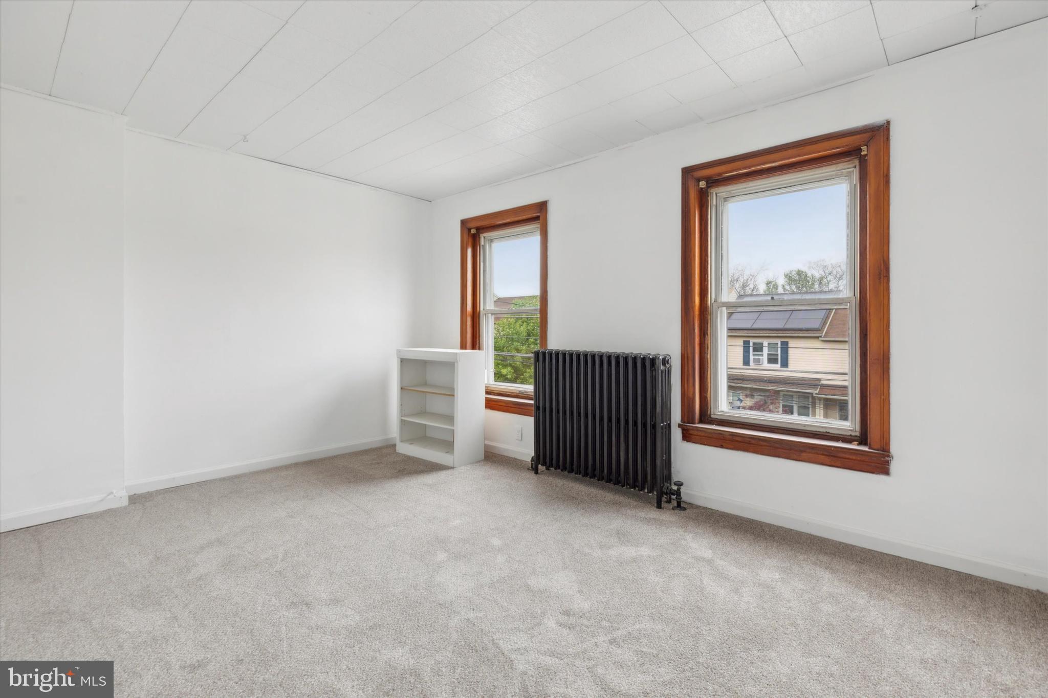 823 Coates Street Bridgeport, PA 19405 - Photo 13 of 20 an empty room with windows and closet
