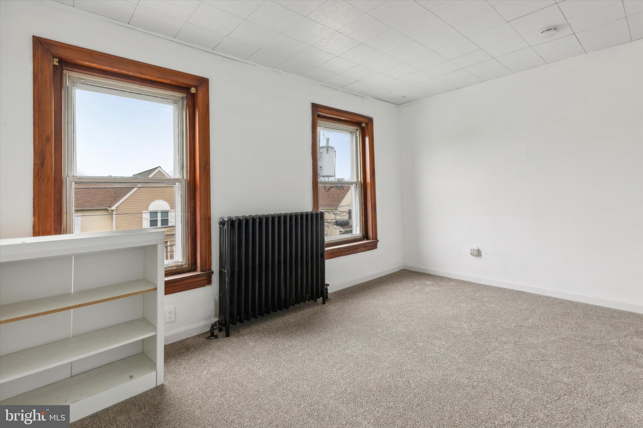 823 Coates Street Bridgeport, PA 19405 - Photo 14 of 20 a view of an empty room and a window