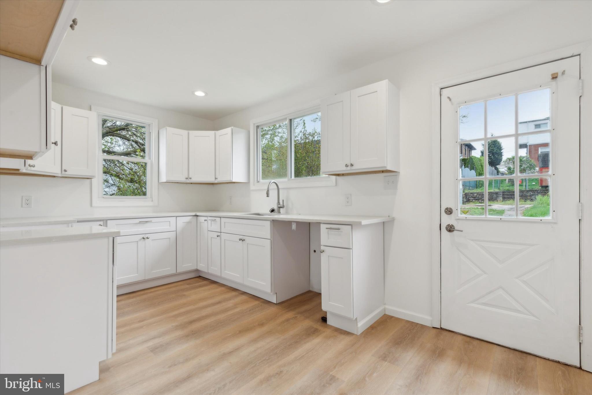 823 Coates Street Bridgeport, PA 19405 - Photo 2 of 20 a kitchen with sink a window and cabinets