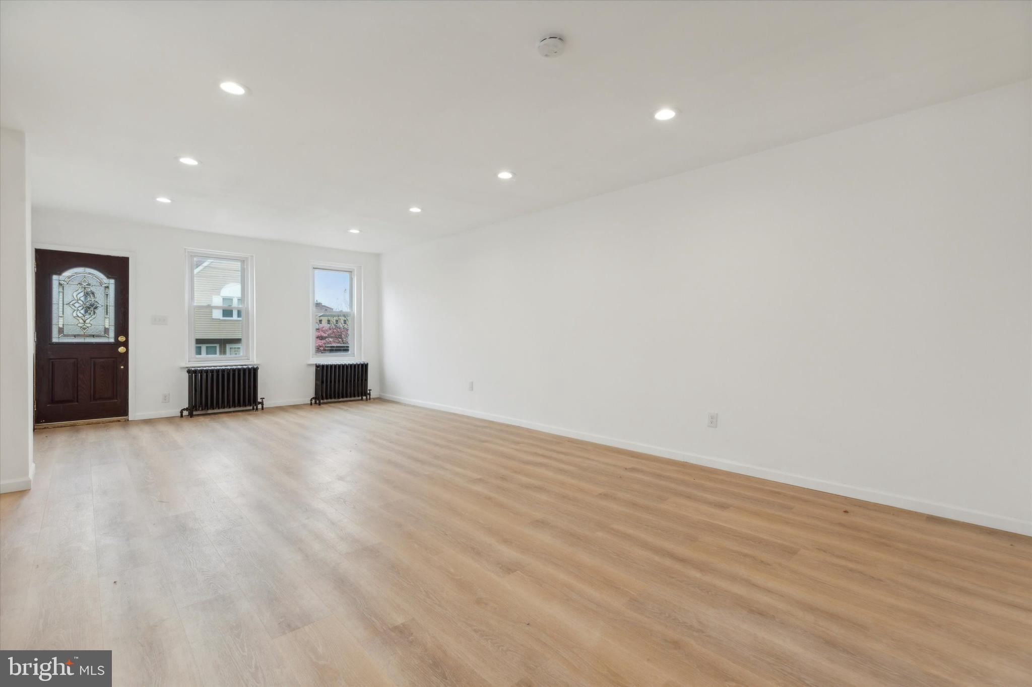 823 Coates Street Bridgeport, PA 19405 - Photo 9 of 20 a view of empty room with wooden floor