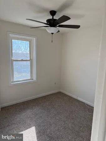 a view of a room with a window