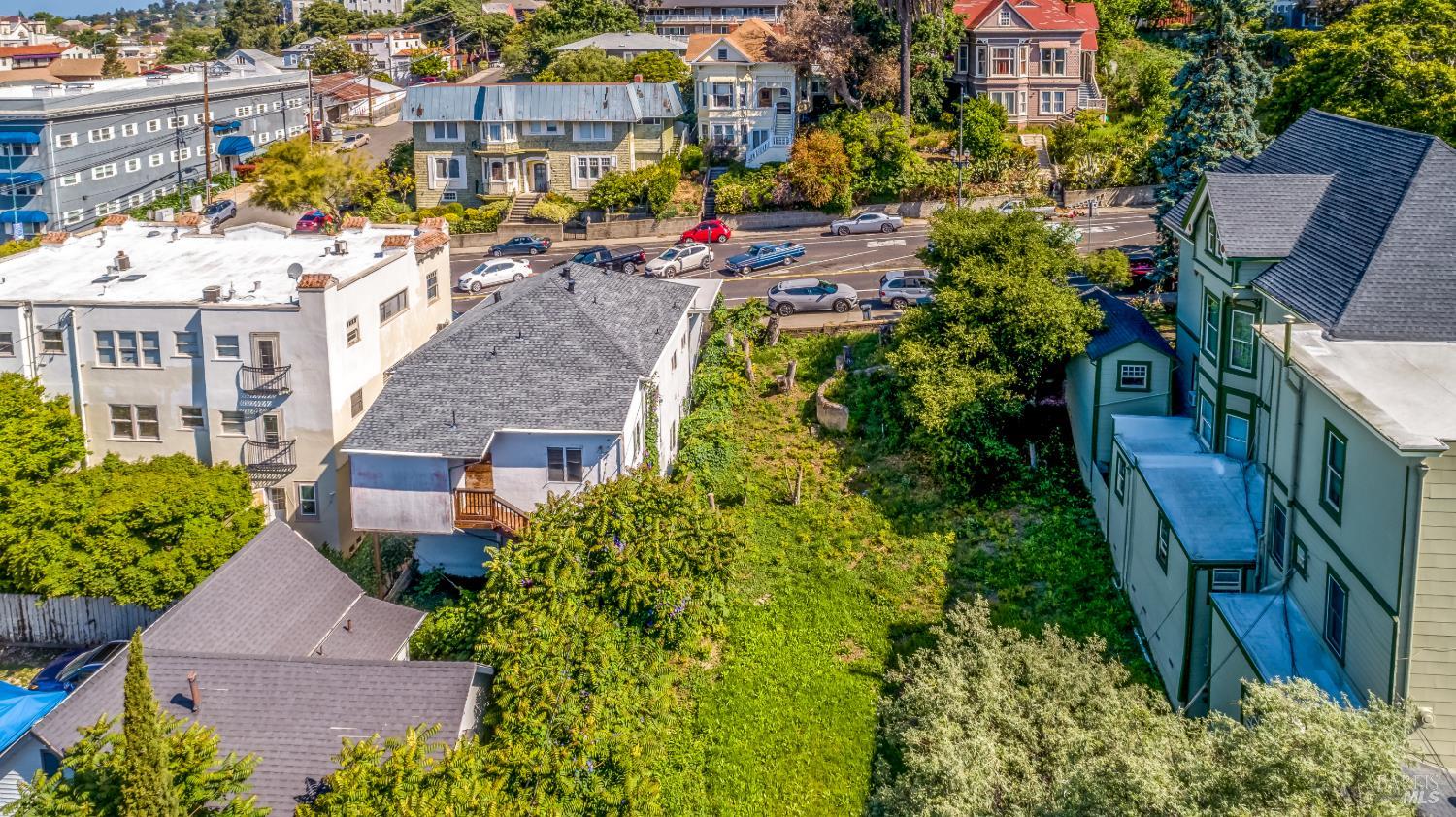 613 Georgia Street Vallejo, CA 94590 - Photo 1 of 19 an aerial view of multiple houses with yard