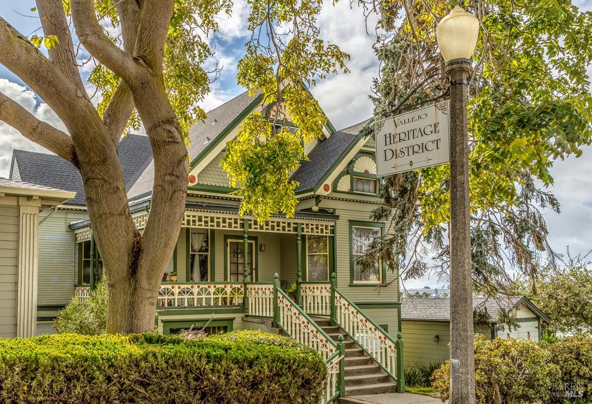 613 Georgia Street Vallejo, CA 94590 - Photo 13 of 19 a front view of a house with a tree