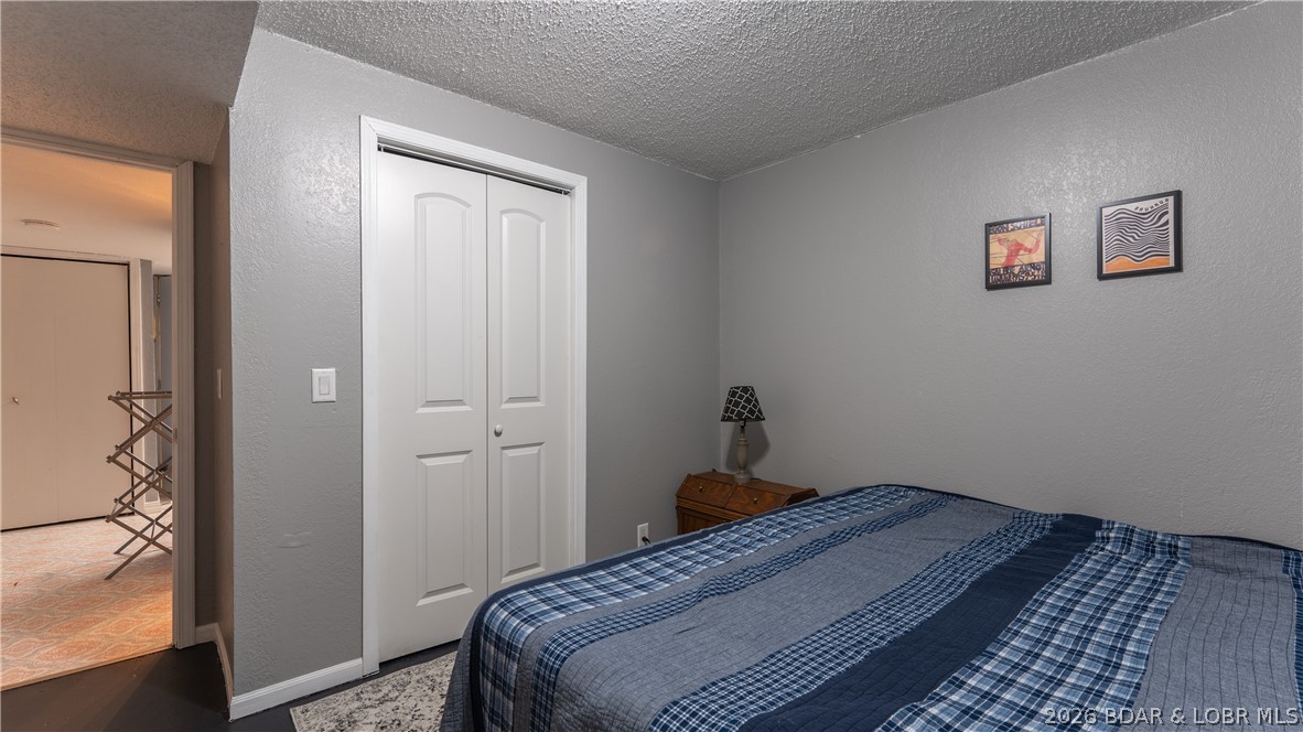 54 Sunset Road Lake Ozark, MO 65049 - Photo 17 of 37 Lower level bedroom 2