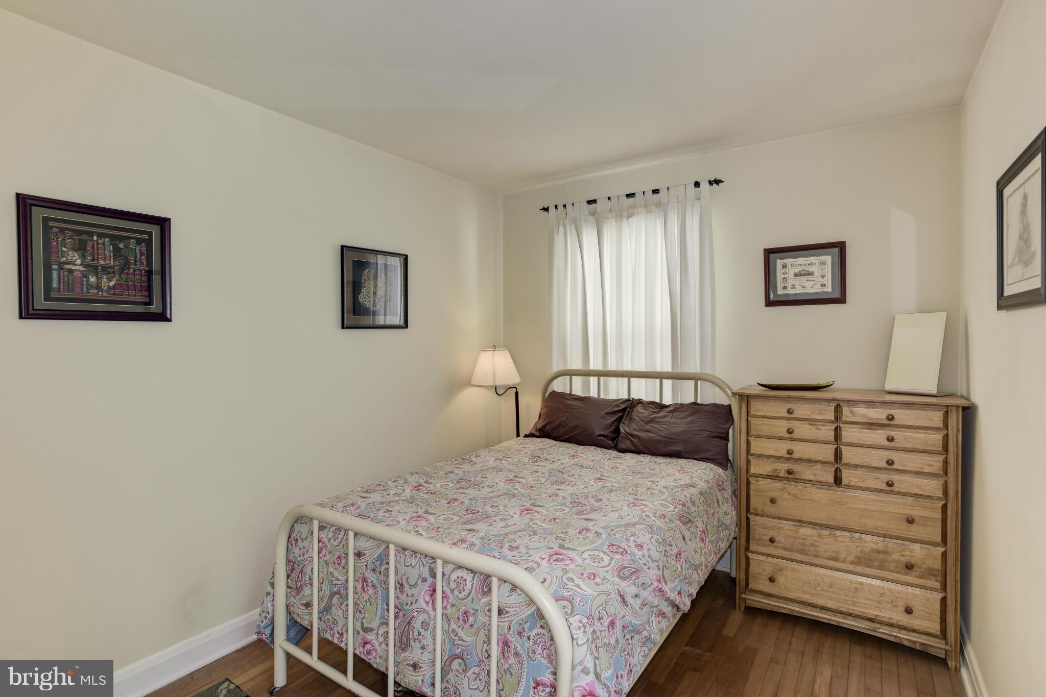 5521 Waterloo Road Ellicott City, MD 21043 - Photo 17 of 30 a bedroom with a bed and a window