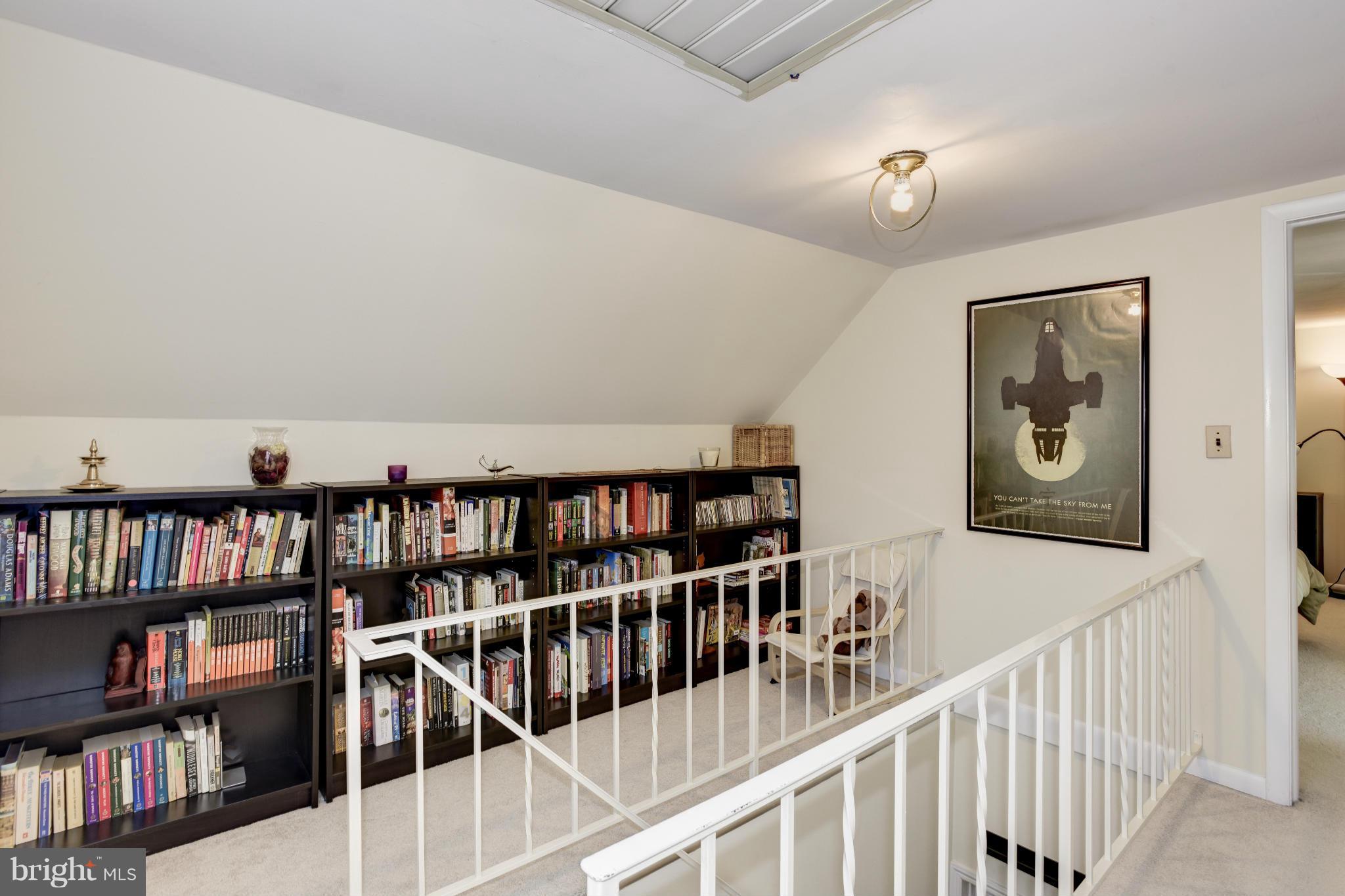 5521 Waterloo Road Ellicott City, MD 21043 - Photo 19 of 30 a view of a hallway with bookshelf