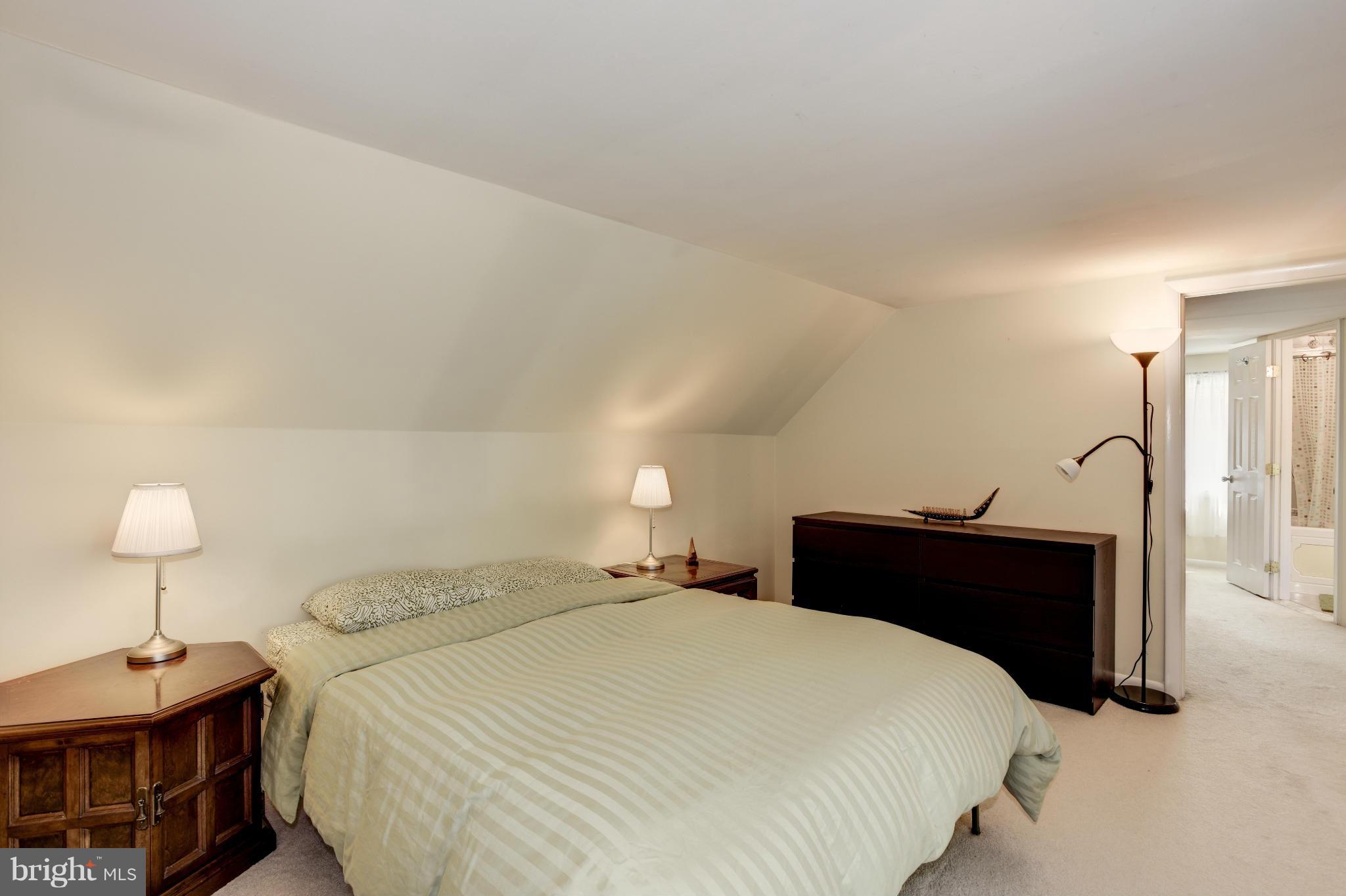 5521 Waterloo Road Ellicott City, MD 21043 - Photo 21 of 30 a bedroom with a bed and a night stand