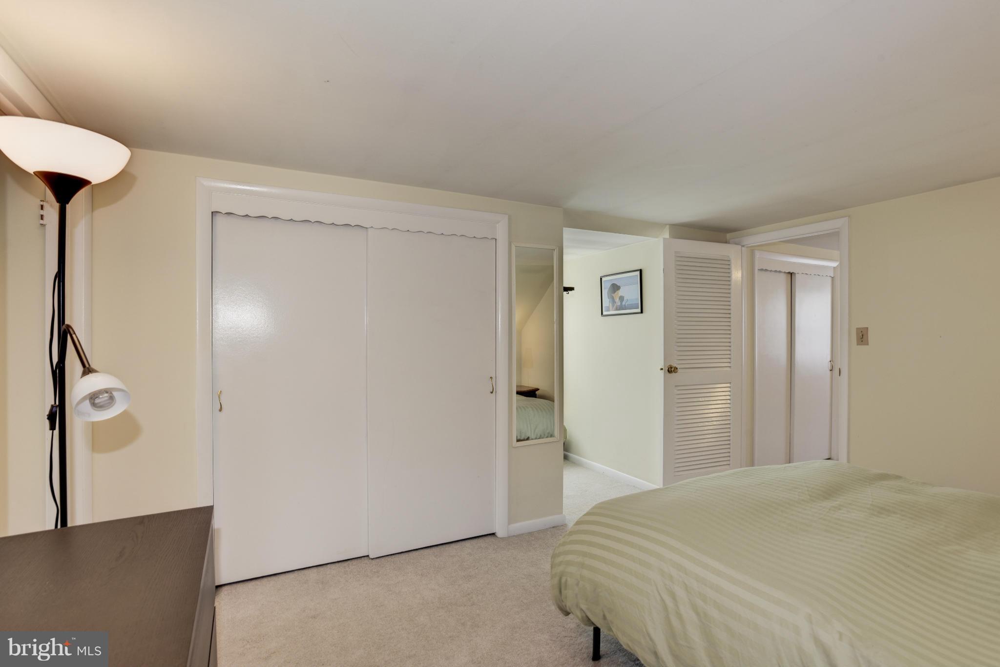 5521 Waterloo Road Ellicott City, MD 21043 - Photo 23 of 30 a bedroom with a bed and a shower