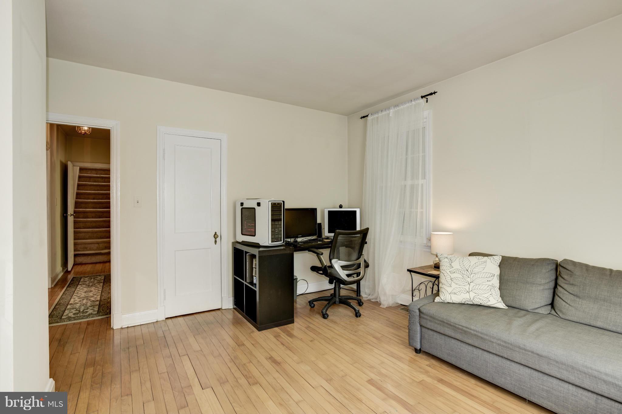 5521 Waterloo Road Ellicott City, MD 21043 - Photo 7 of 30 a living room with furniture and a wooden floor