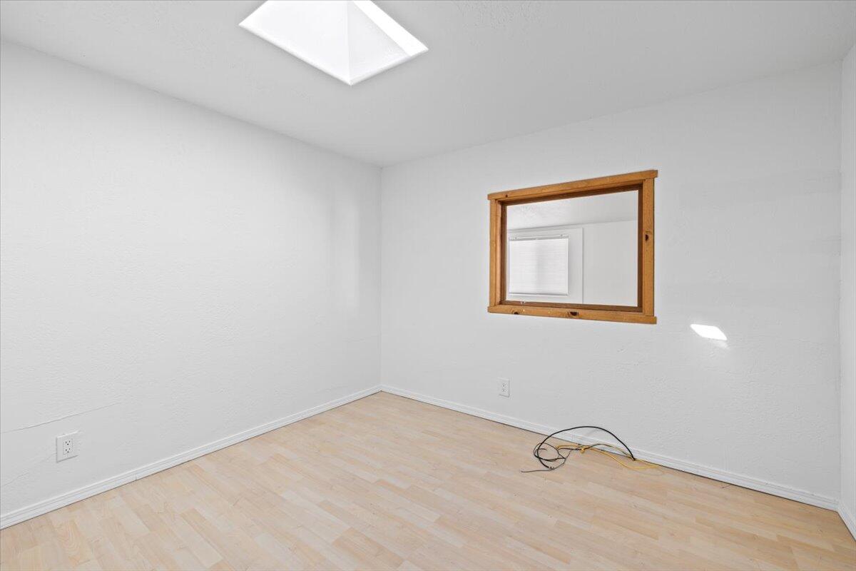 939 South Valley View Road, Unit 12 Ashland, OR 97520 - Photo 11 of 19 a view of a room with rack on the wall
