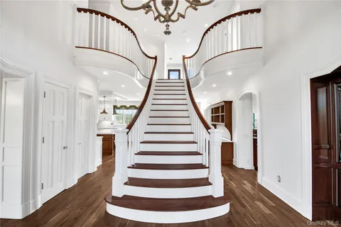 a view of entryway with wooden floor